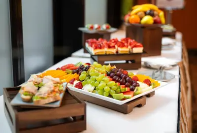 a buffet with a variety of fruits and pastries at Grand Majestic Hotel Prague in Prague