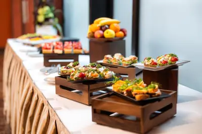 a buffet line with many plates of food at Grand Majestic Hotel Prague in Prague