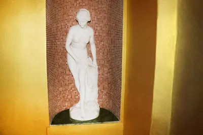 a white statue of a woman in a towel at Residence Seven Angels in Prague