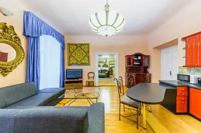 a living room with a couch and a table at Residence Seven Angels in Prague