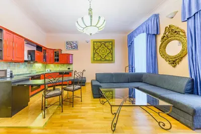 a living room with a couch and a table at Residence Seven Angels in Prague
