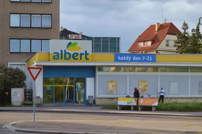 a building with an alert sign in front of it at Pravouhla in Prague