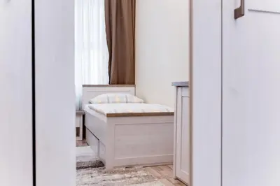 a bedroom with a bed and a window at Apartment Masná 21 in Prague