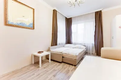 a living room with a couch and a table at Apartment Masná 21 in Prague