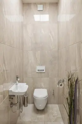 a bathroom with a toilet and a sink at Masná - Old Town Residence in Prague