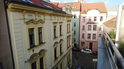 a view from the balcony of a building at Downtown Apartments Kozatska in Prague
