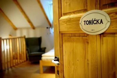 a sign on the door of a room at Starý Svět in Wotitz