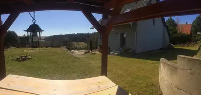 a view of a yard with a gazebo at Chata u rybníka in Mšecké Žehrovice