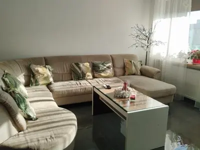 a living room with a couch and a coffee table at Ubytování Irena in Benešov