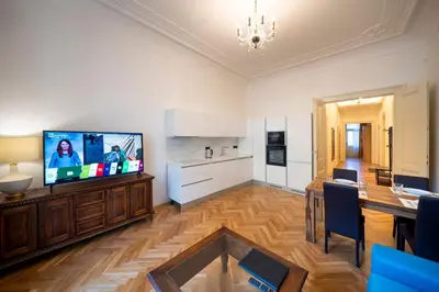 a window with chairs and a table in front of a building at Old Town - Aparthotel Michalska in Prague