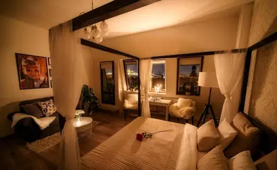 a bedroom with a bed and a room with a desk at A/C + TERRACE Breakfast at Tiffany’s in Prague