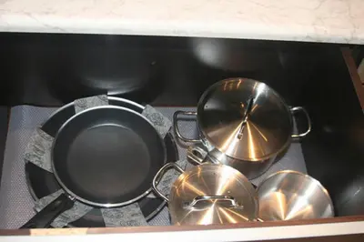 a group of pots and pans sitting on a stove at Apartment Argentinská 8 in Prague