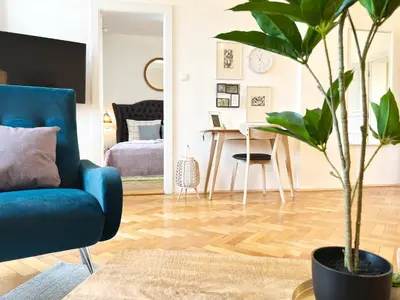 a living room with a bed and a couch at Residence Charles Bridge in Prague