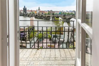 a view of a river from a window at Residence Charles Bridge in Prague