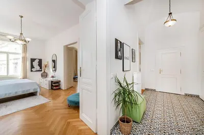 a bedroom with a bed and a potted plant at Quiet Apartment in The Old Town in Prague
