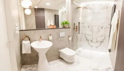 a bathroom with a sink and a toilet and a shower at Residence Glamour Premium in Prague