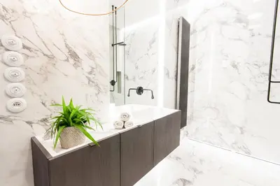 a bathroom with a sink and a shower at Residence Glamour Premium in Prague