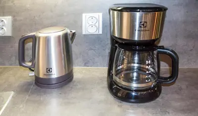 a black and silver blender sitting on top of a counter at Luxury apartments Pricna in Prague