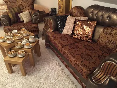 a living room with a couch and a coffee table at Imperial Rezidence in Prague