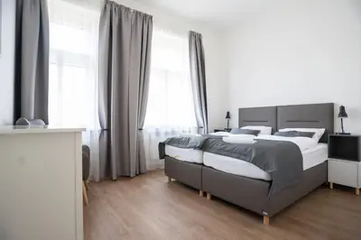 an empty room with a closet and a hallway at Residence St Havel Prague Old Town in Prague