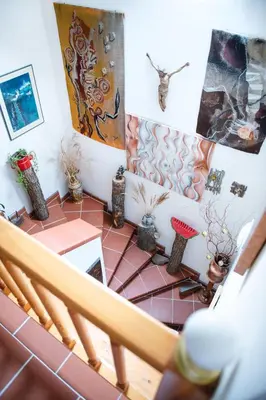 an overhead view of a room with a staircase with plants at Bydleni u Babicky in Bratronice