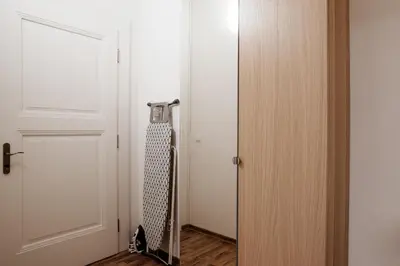 a door that is open to a room at Apartment Gesse Jirsikova in Prague