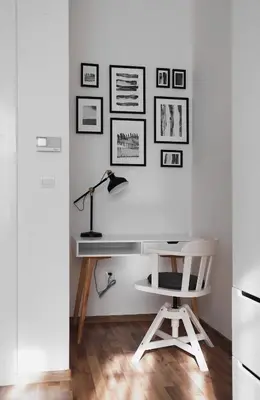 a desk with a lamp and a chair in a room at Apartment Gesse Jirsikova in Prague