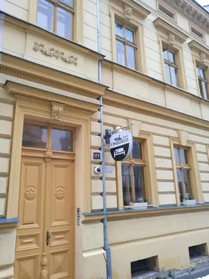 a stop sign in front of a building at Apartmány V Podzámčí II. in Mělník