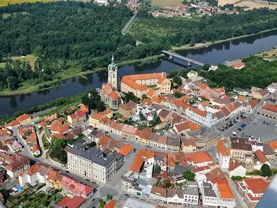 an aerial view of a town next to a river at Apartmány V Podzámčí II. in Mělník