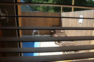 a view of a balcony with a fence and a sink at Sporthotel BK Pod Lipou in Roudnice nad Labem