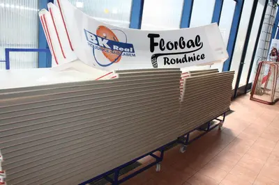 a bench with a sign for toronto roosters at Sporthotel BK Pod Lipou in Roudnice nad Labem
