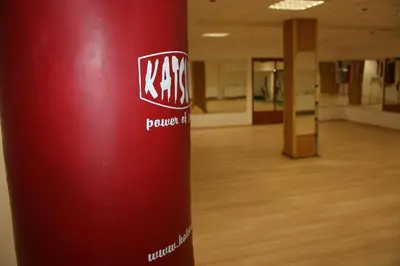 a red pole in the middle of a room at Sporthotel BK Pod Lipou in Roudnice nad Labem