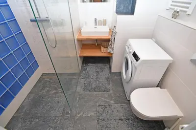 a bathroom with a toilet and a sink at Lovely little cosy Apt in Prague in Prague