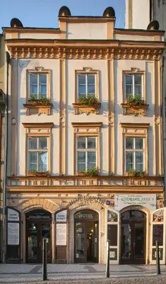 a large building with windows on a street at Antik Hotel Prague in Prague