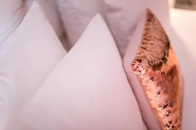 a close up of a banana leaning against a wall at Friday Hotel in Prague