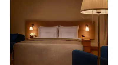 a bedroom with a large bed with white pillows at Mostecká 12 Residence in Prague