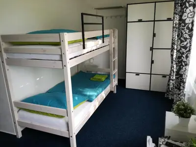 a bunk bed room with two bunk beds at Sporthotel Zimní stadion Benešov in Benešov