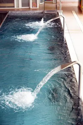 a pool of water with a water hose at Sporthotel Zimní stadion Benešov in Benešov