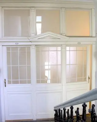 a large white garage door in a room at Prague Palace - Wenceslas Square in Prague