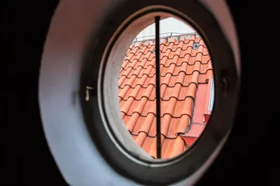a view of a window of a roof at Miss Sophie's Charles Bridge in Prague