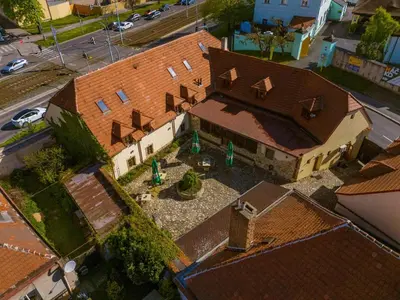 an overhead view of a large building with a roof at Hotel BELLA in Prague