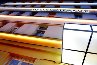 a hotel sign on the side of a building at Hotel Merkur - Czech Leading Hotels in Prague