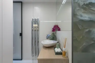 a bathroom with a bowl sink on a counter at Fully renovated stylish duplex in a convenient location in Prague