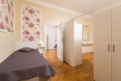 a bedroom with a bed in a room at Vincanto Apartments Oldtown Prague1 in Prague