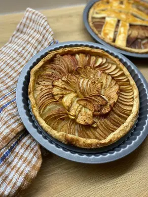 a pie in a blue plate on a table at Bohem Prague Hotel in Prague
