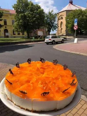 a cake with spiders on top of it on a street at Penzion Čokolaterie in Třebenice