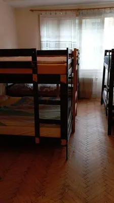 two bunk beds in a room with a window at flat 18 minutes from Vaclavske namesti in Prague