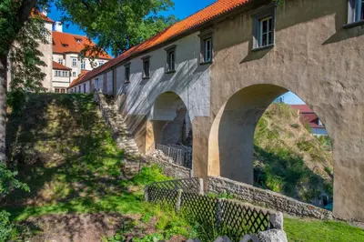 a stone bridge with arches on a building at Villa Letná in Brandýs nad Labem-Stará Boleslav