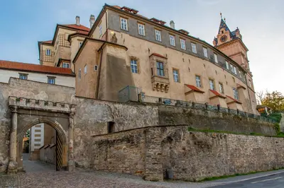 an old building with an archway in front of it at Villa Letná in Brandýs nad Labem-Stará Boleslav
