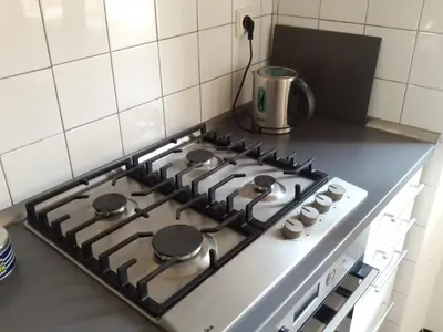 a stove top with a bunch of pots and pans on it at Old Town Magical place in Prague